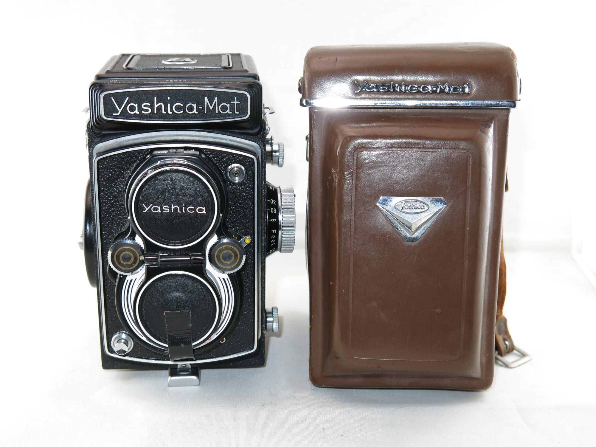 TLR Yashica-Mat. (circa. 1957) vintage camera. Working. + Lens hood bonus.