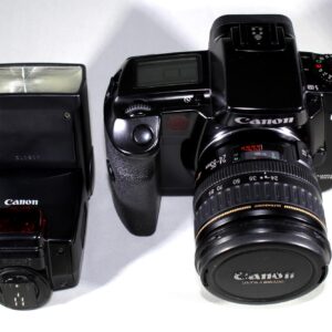 Canon Eos 5 SLR film camera bundled w/ Canon Zoom EF 24-85mm f/3.5-4.5 USM lens and flash unit in good used condition. Japan version, Rare!