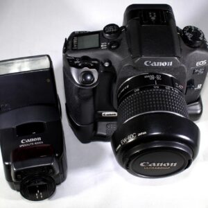 Canon EOS Elan 7ne SLR film camera bundled w/Canon Zoom EF 28-80mm f/3.5-5.6 usm, battery pack and flash unit. Working & in excellent shape!