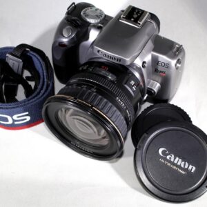 Canon EOS Rebel T2 SLR film camera bundled w/Canon Zoom EF 20-35mm f/3.5-4.5 usm and original strap!. Working & in excellent shape!