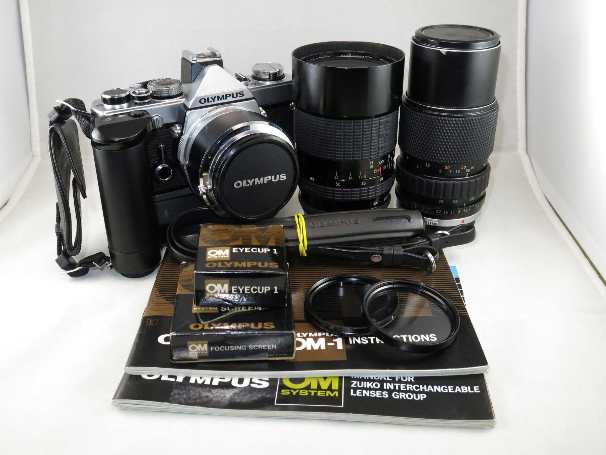 Olympus OM-1N SLR film camera CLA'd with 3 lenses + accessories, used in working condition