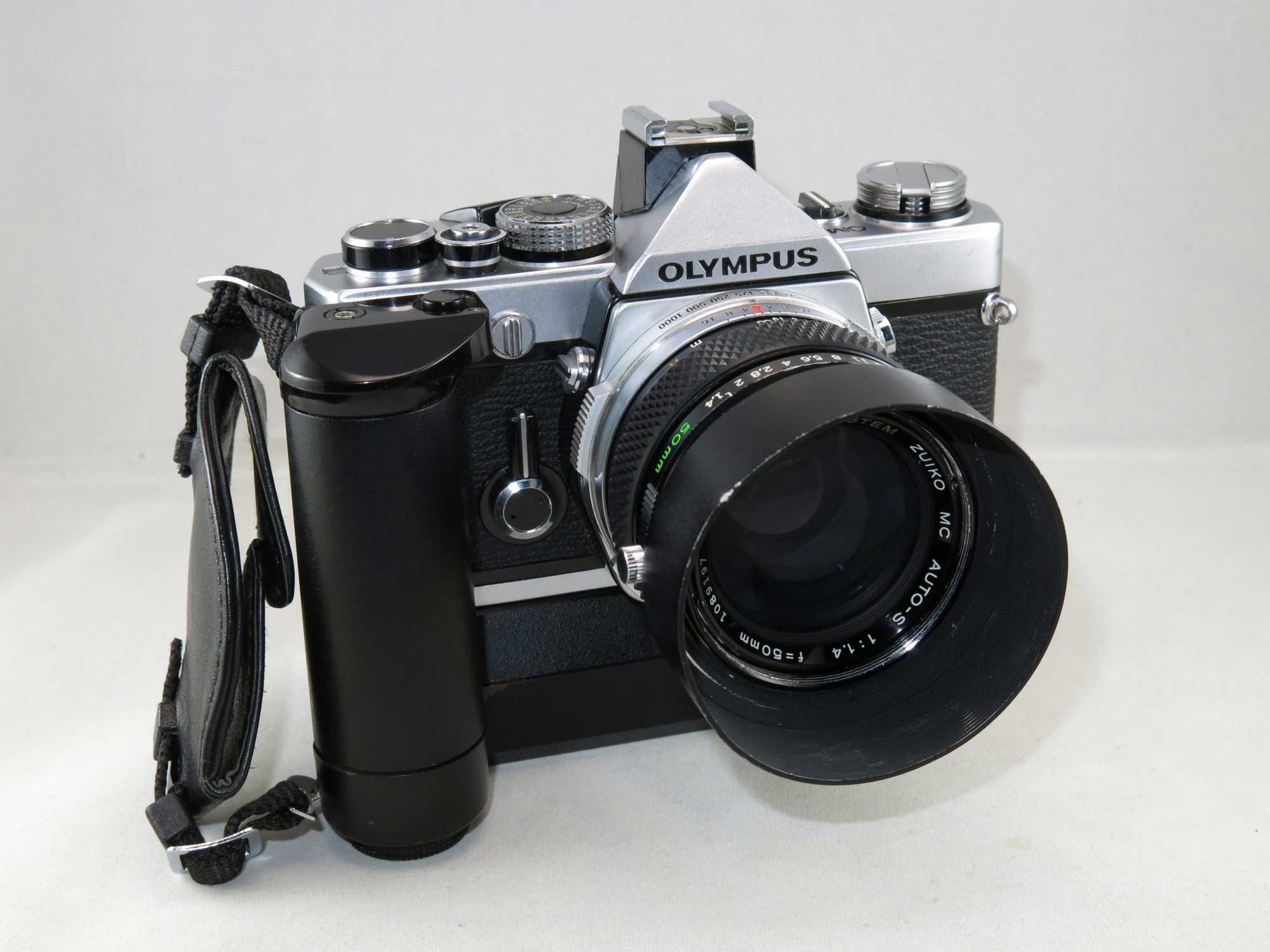 Olympus OM-1N SLR film camera CLA'd with 3 lenses + accessories, used in working condition - Image 2