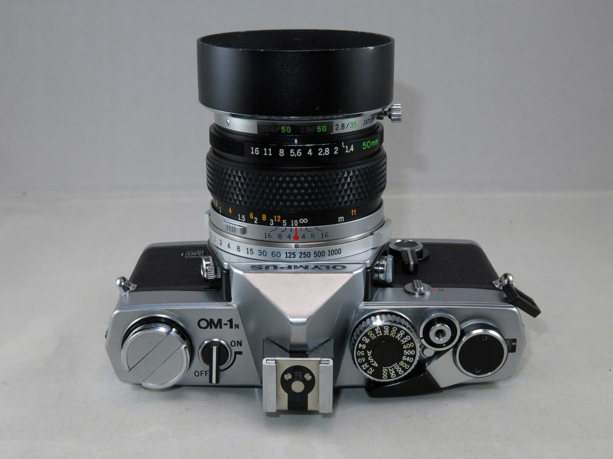 Olympus OM-1N SLR film camera CLA'd with 3 lenses + accessories, used in working condition - Image 12